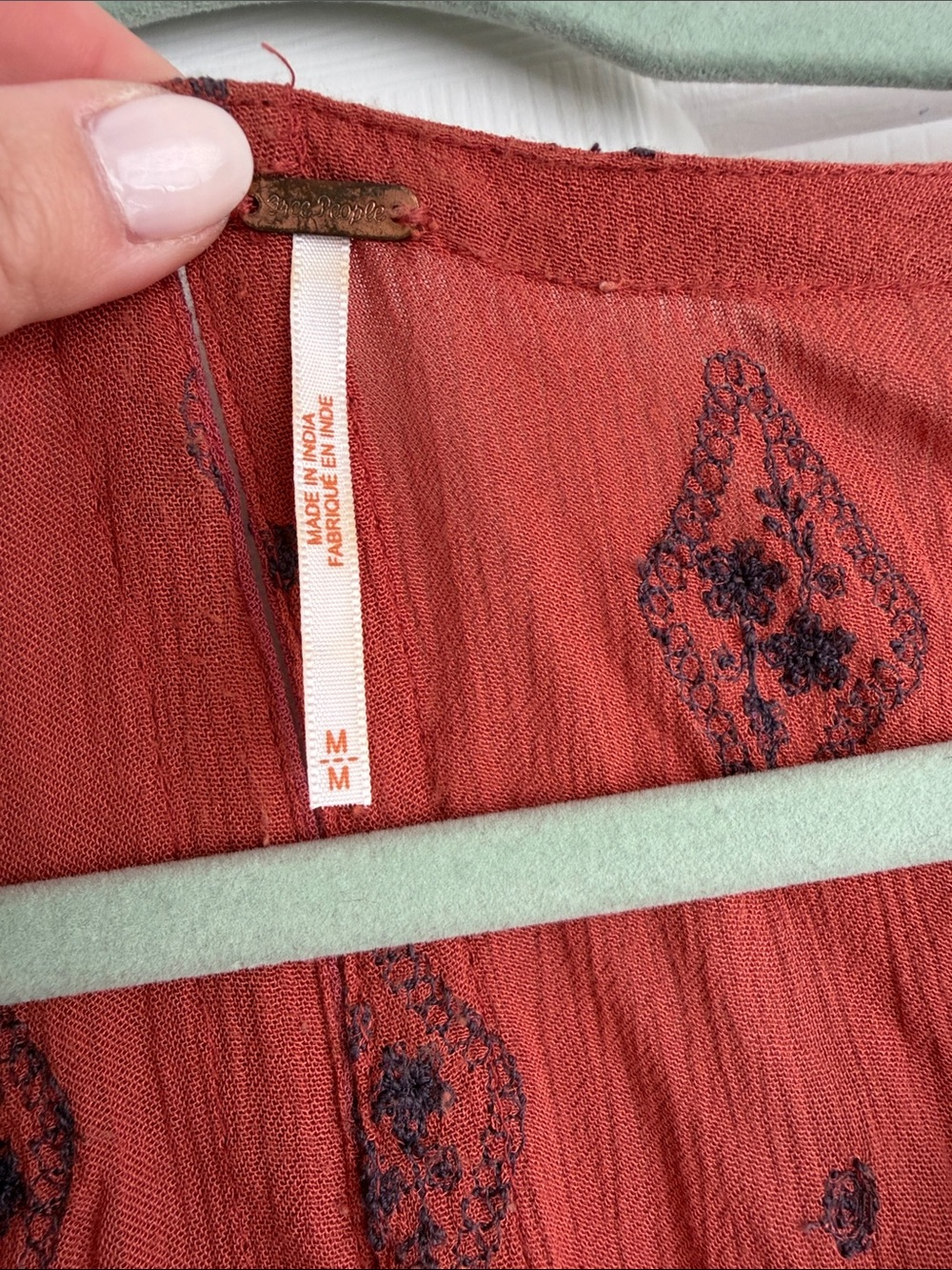 Free People women’s embroidered tunic. Size M. Burnt orange/ navy combo. - Picture 2 of 3
